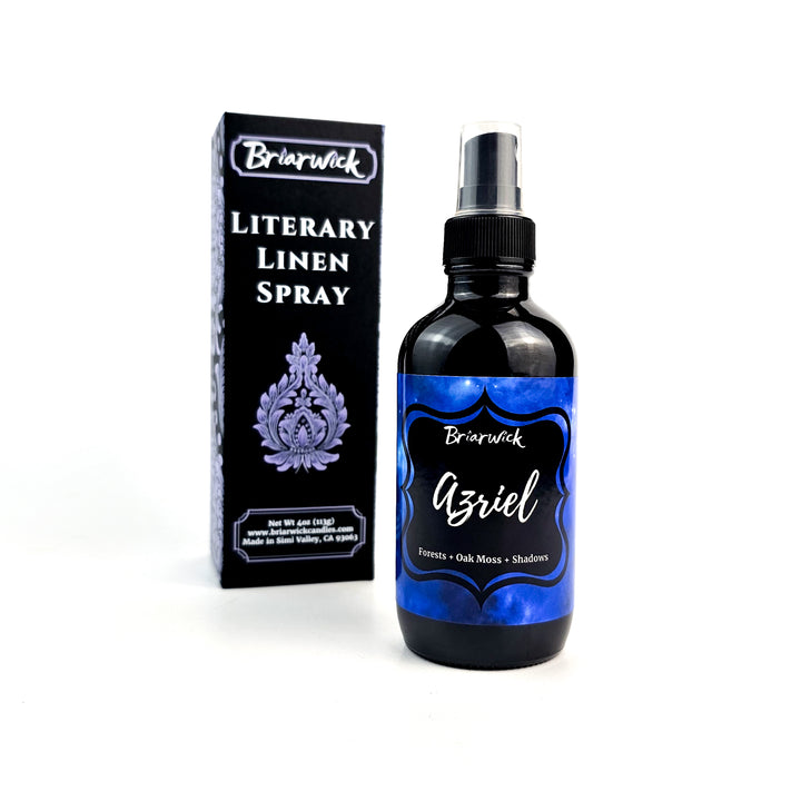 a bottle of spray sitting next to a box
