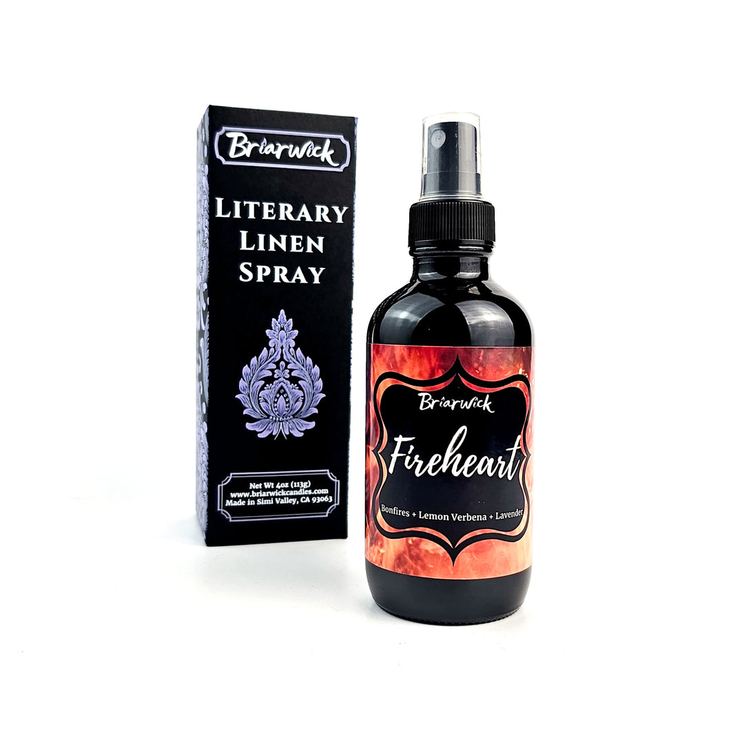 a bottle of liquid sitting next to a box