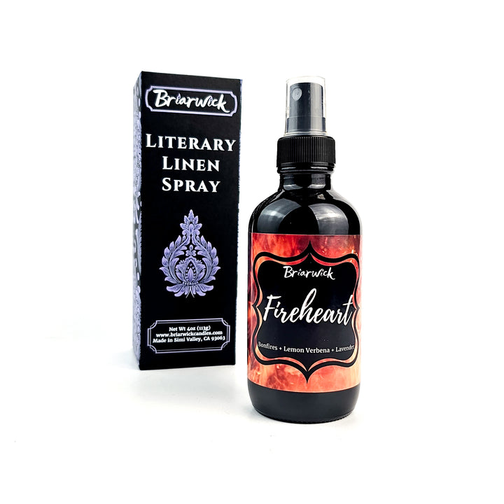 a bottle of liquid sitting next to a box