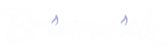 White Briarwick Logo with Purple Flames as the dots for the I's.