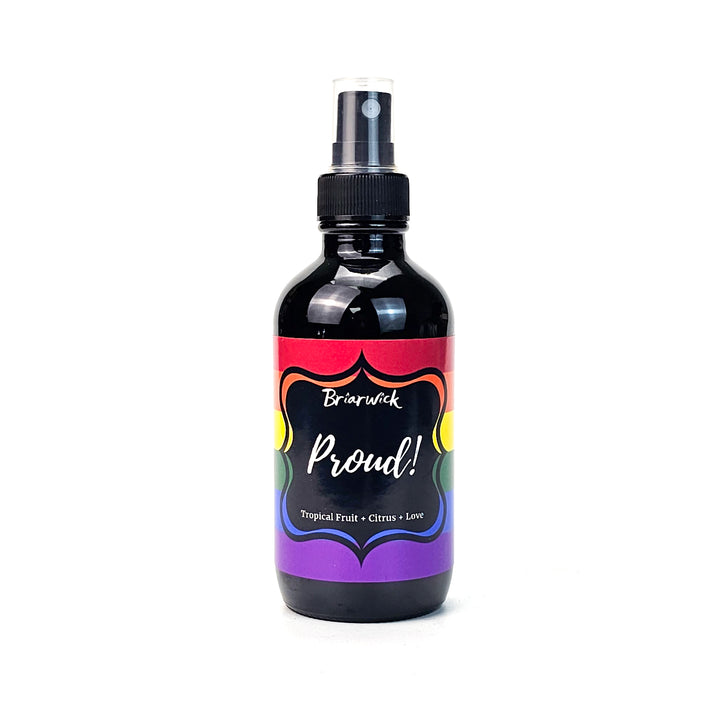 PROUD! 4oz Linen Spray with rainbow pride flag on a white background