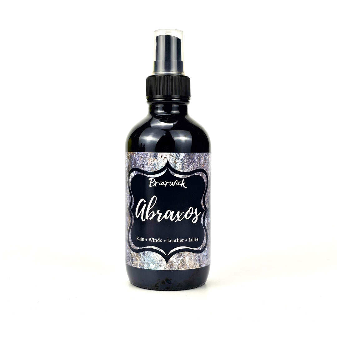 Abroaxos 4oz Linen Spray with gray textured design on a white background