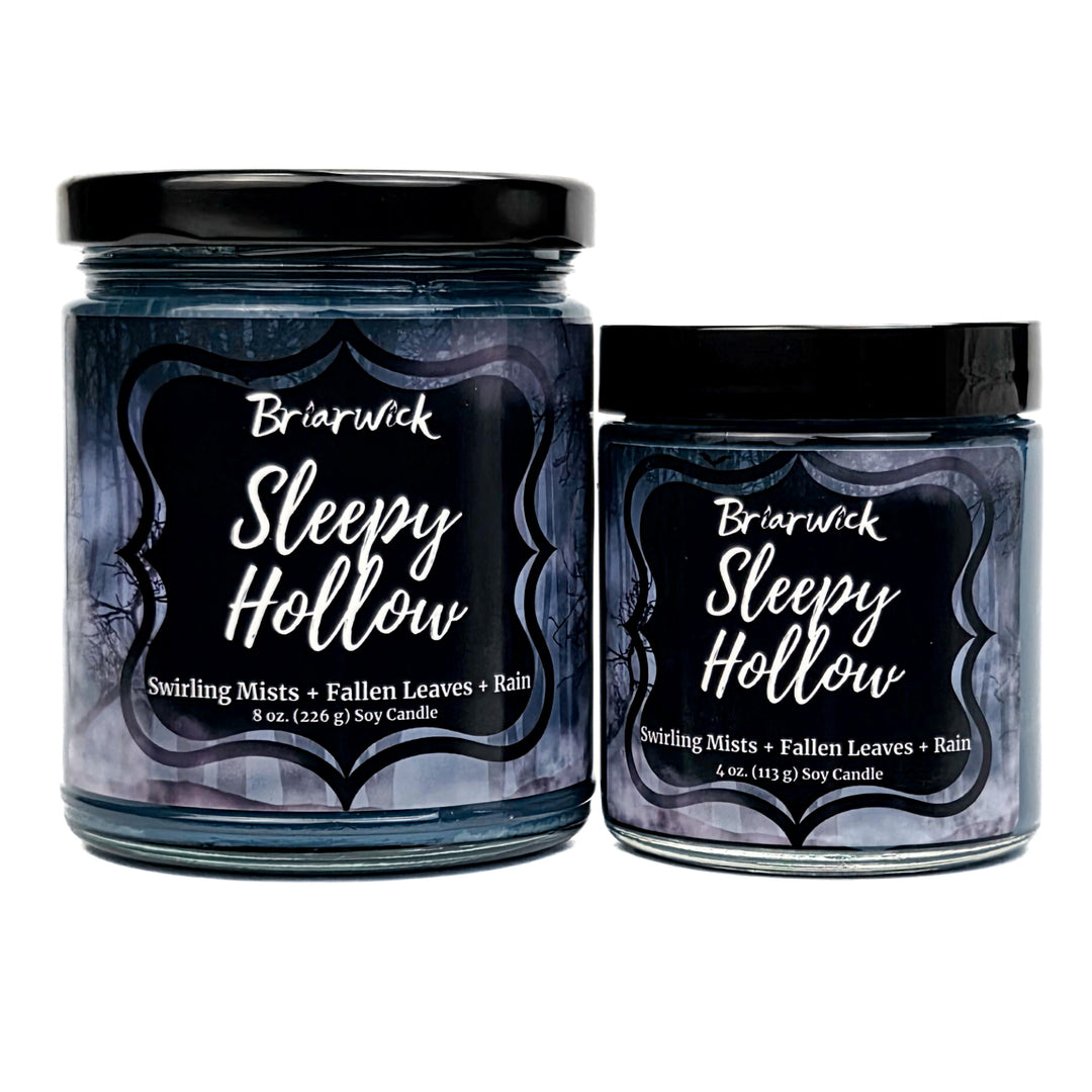 Sleepy Hollow 8oz & 4oz dark teal candles with forest patterns on a white background