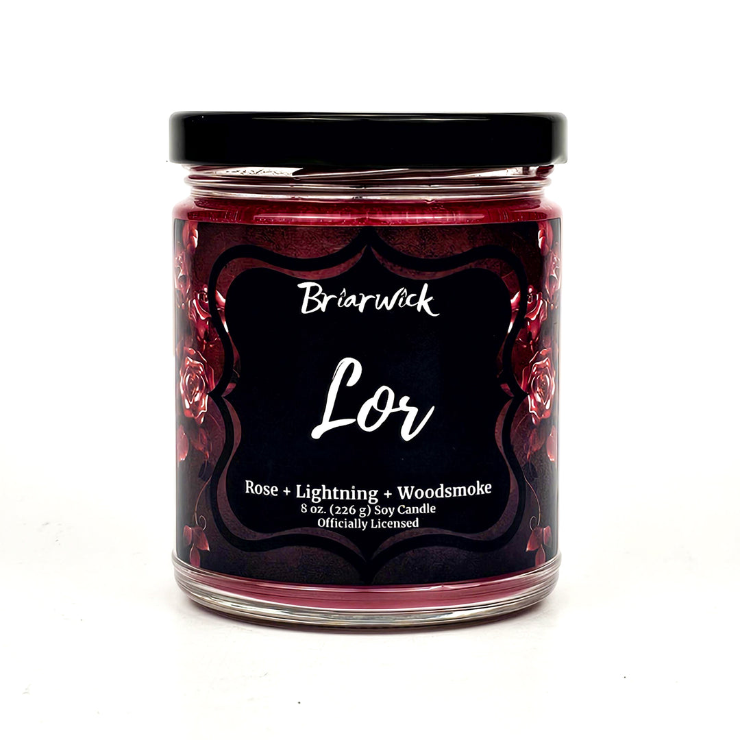 a jar of lor is sitting on a white surface