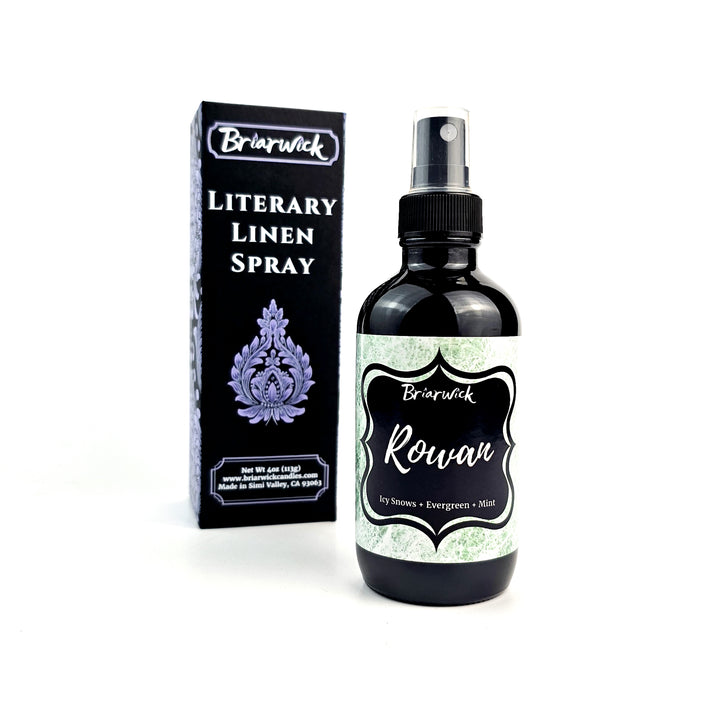 a bottle of liquid next to a box