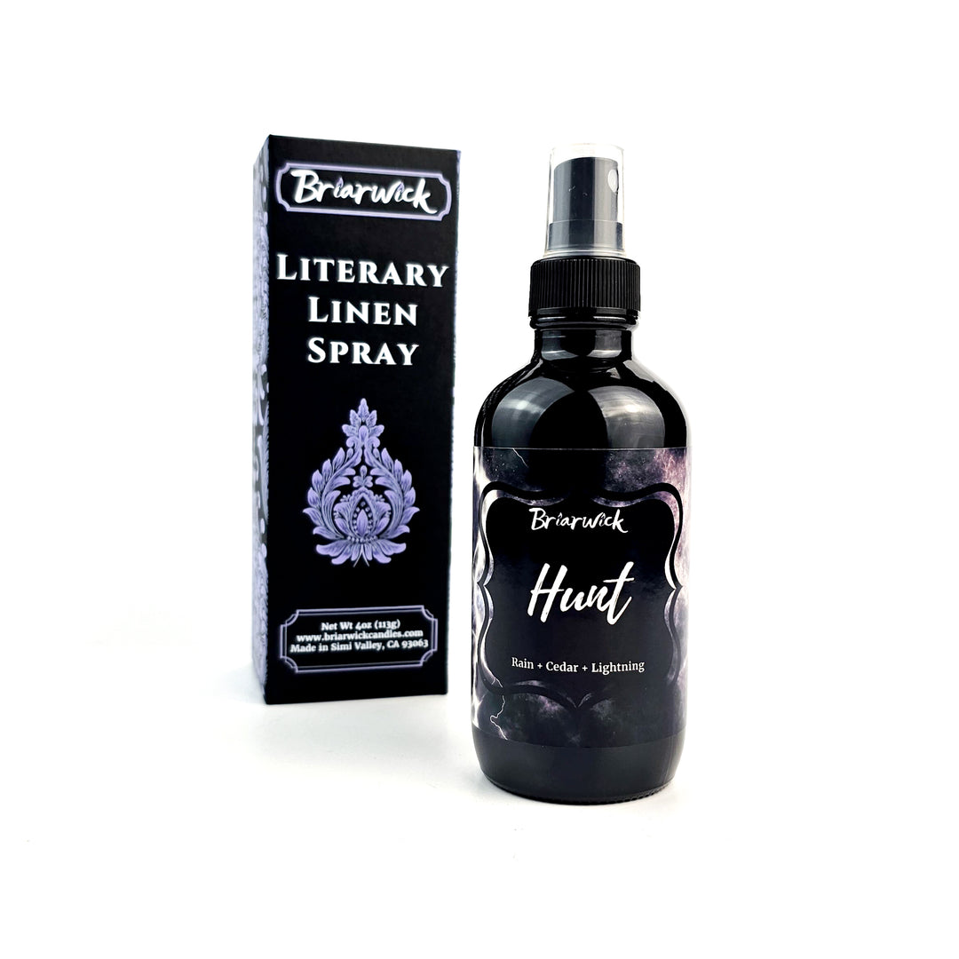 a bottle of liquid sitting next to a box