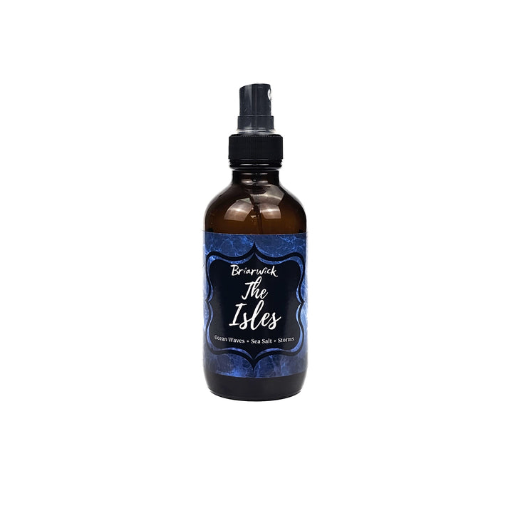 The Isles 4oz Linen Spray with blue smoke design on a white background