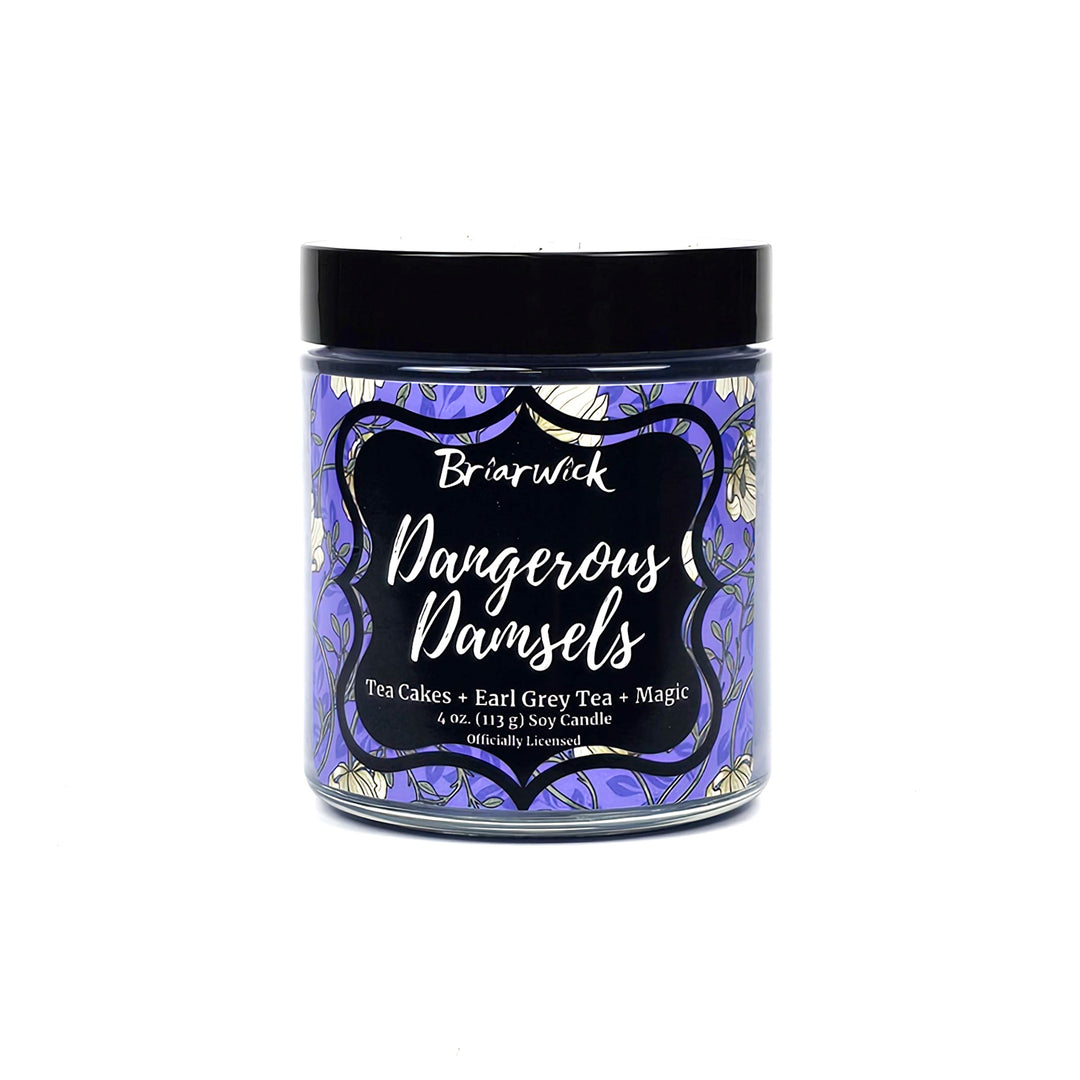 purple 4 oz glass jar candle with floral label called Dangerous Damsels on a white background