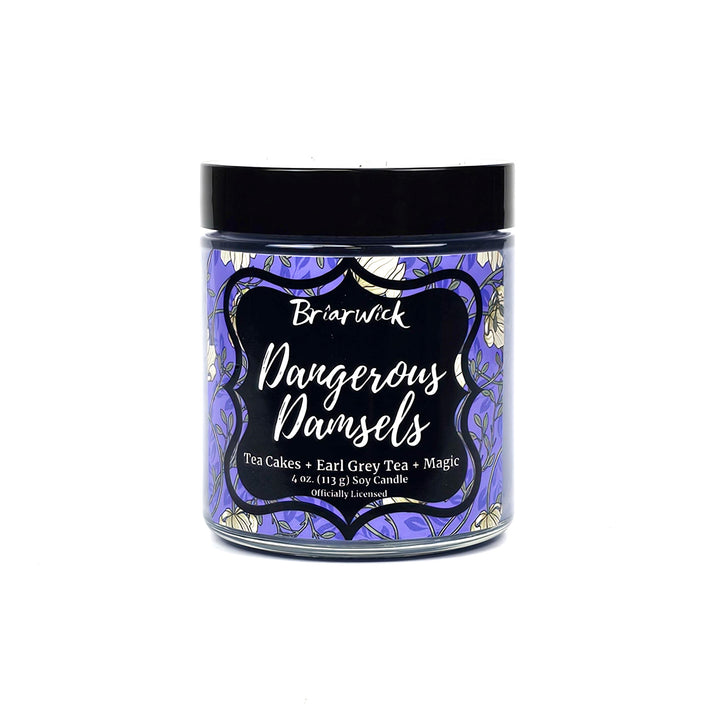purple 4 oz glass jar candle with floral label called Dangerous Damsels on a white background