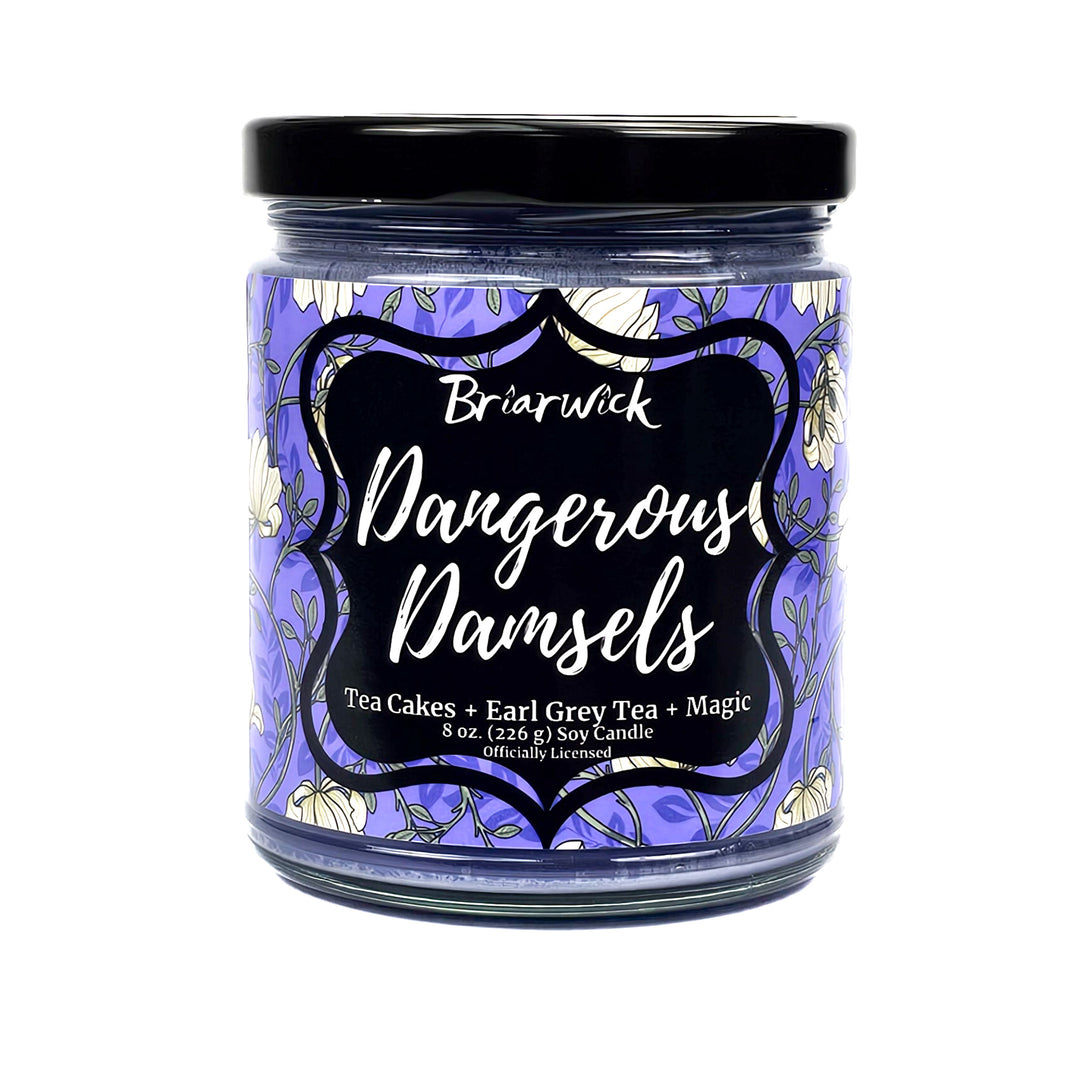 purple 8 oz glass jar candle with floral label called Dangerous Damsels on a white background