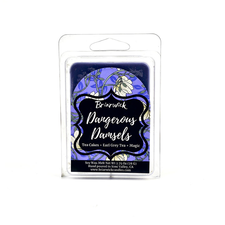 purple wax melt with floral label called Dangerous Damsels on a white background