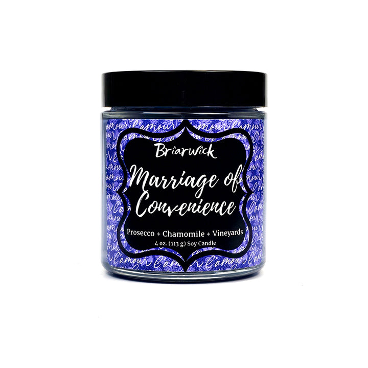 Marriage of Convenience 4oz purple candle with purple handwriting design on a white background