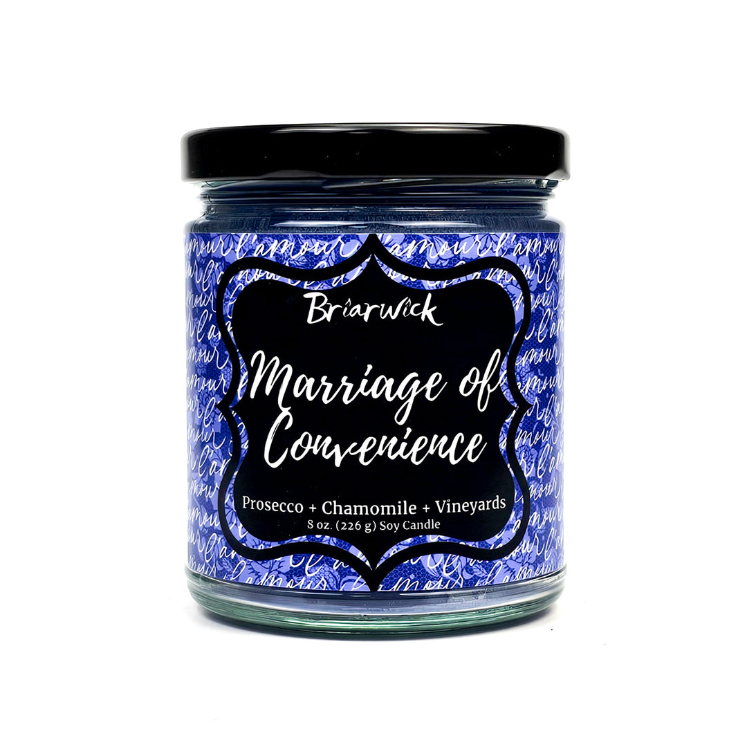 Marriage of Convenience 8oz purple candle with purple handwriting design on a white background