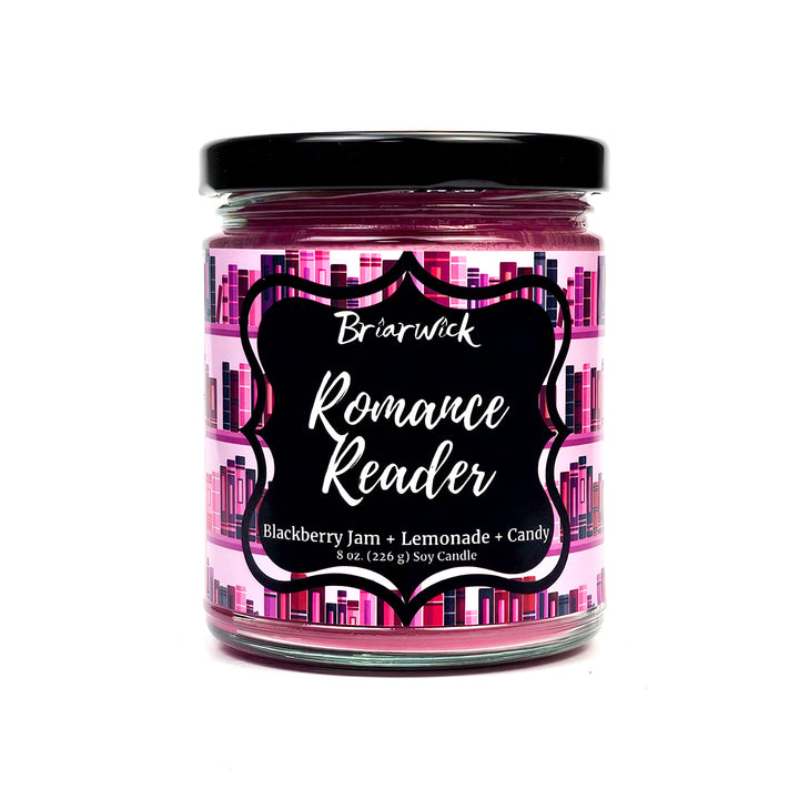 Romance Reader 8oz fuchsia candle with pink bookshelf design on a white background