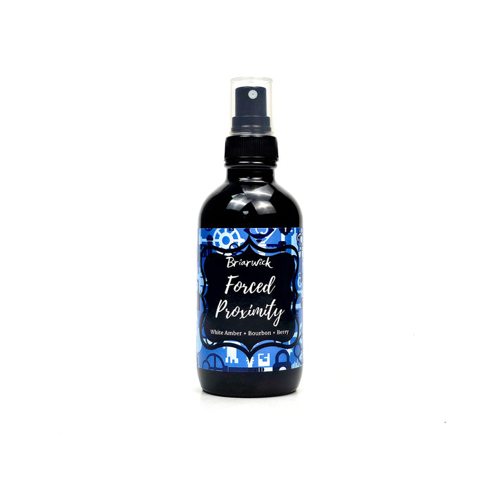 Forced Proximity 4oz Linen Spray with blue lock & key design on a white background