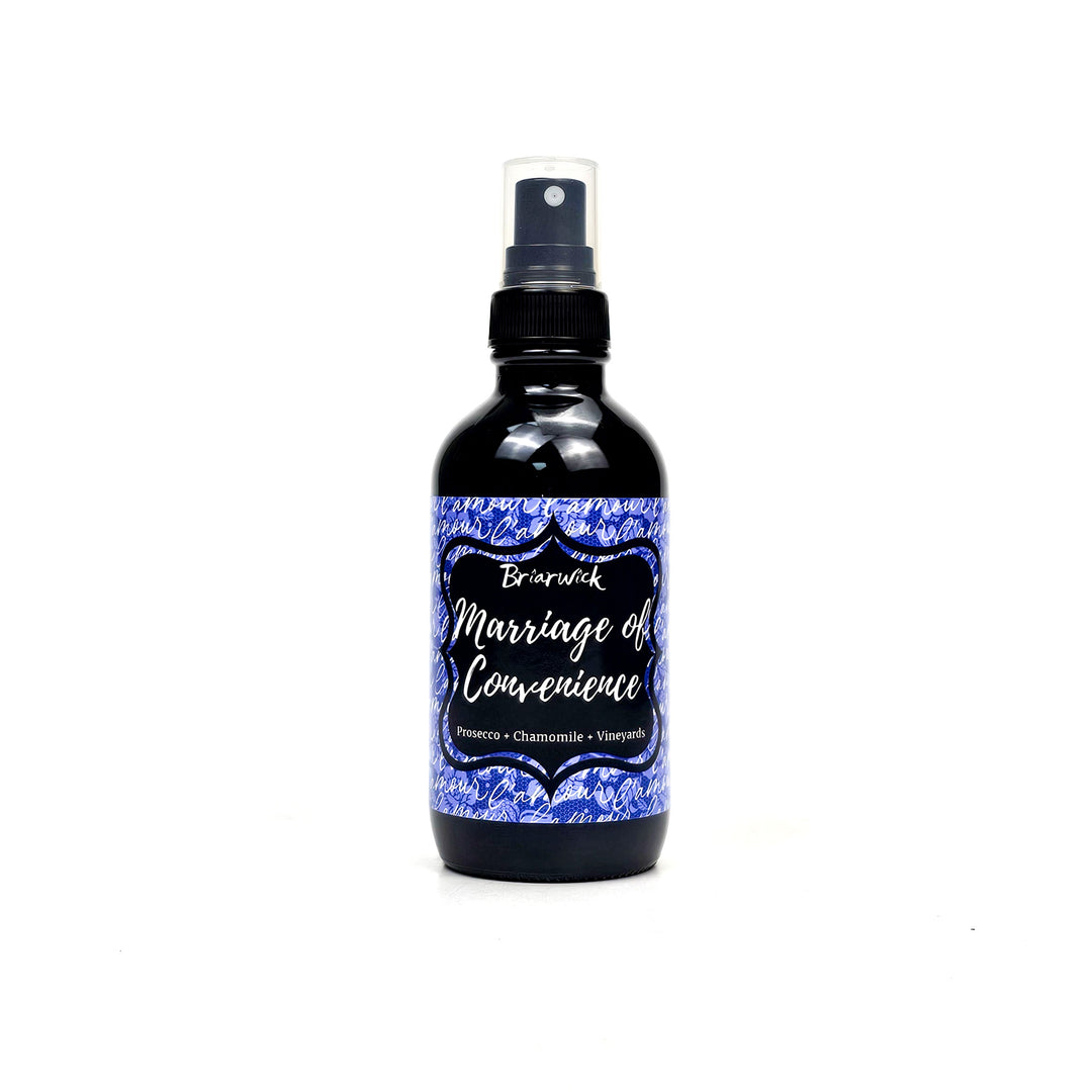 Marriage of Convenience 4oz Linen Spray with purple handwriting design on a white background