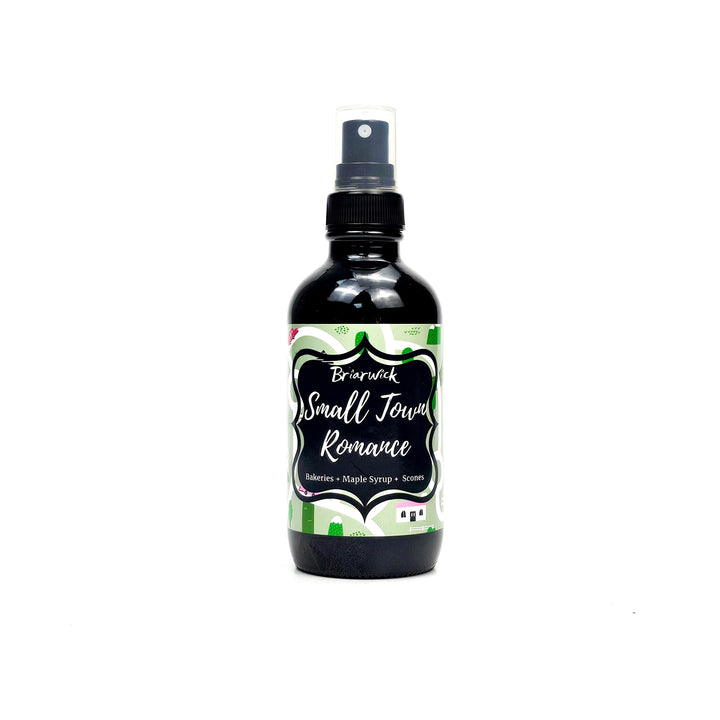 Small Town Romance 4oz Linen Spray with green map design on a white background