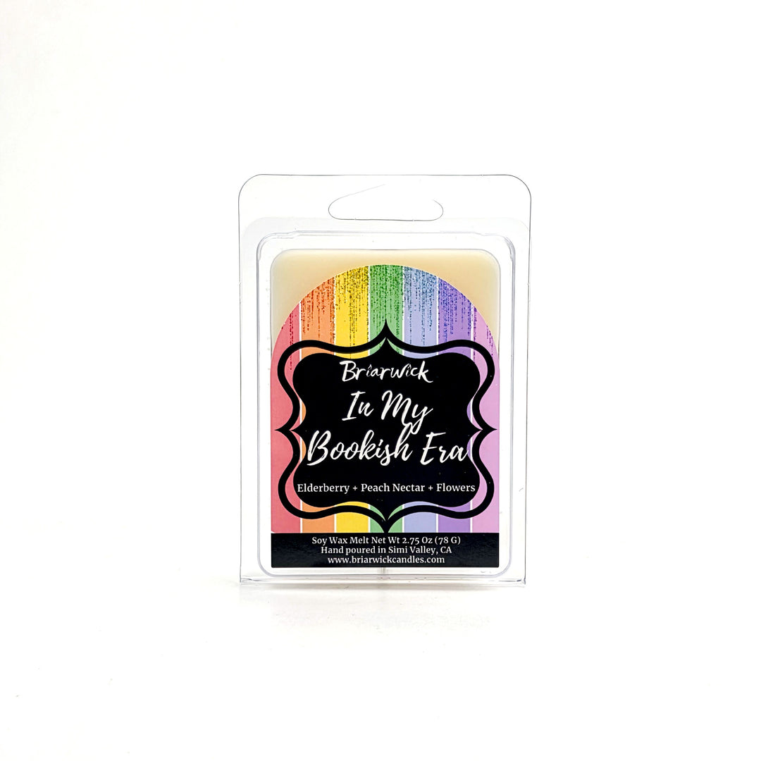 In My Bookish Era 2oz white Wax Melt with sparkly rainbow design on a white background