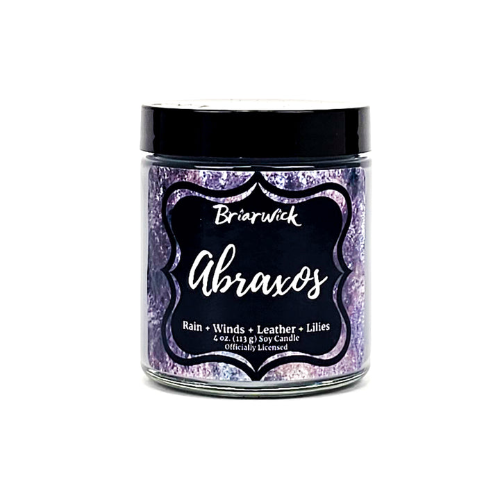 Abroaxos 4oz flint gray candle with gray textured design on a white background