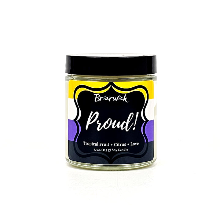PROUD! 4oz white candle with nonbinary pride flag on a white background