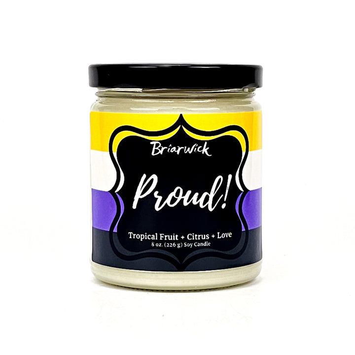 PROUD! 8oz white candle with nonbinary pride flag on a white background