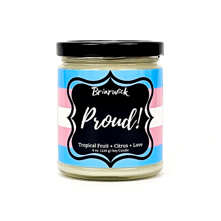 PROUD! 8oz white candle with transgender pride flag on a white background