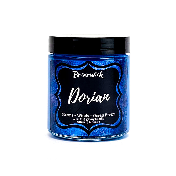 Dorian 4oz cobalt candle with blue textured design on a white background