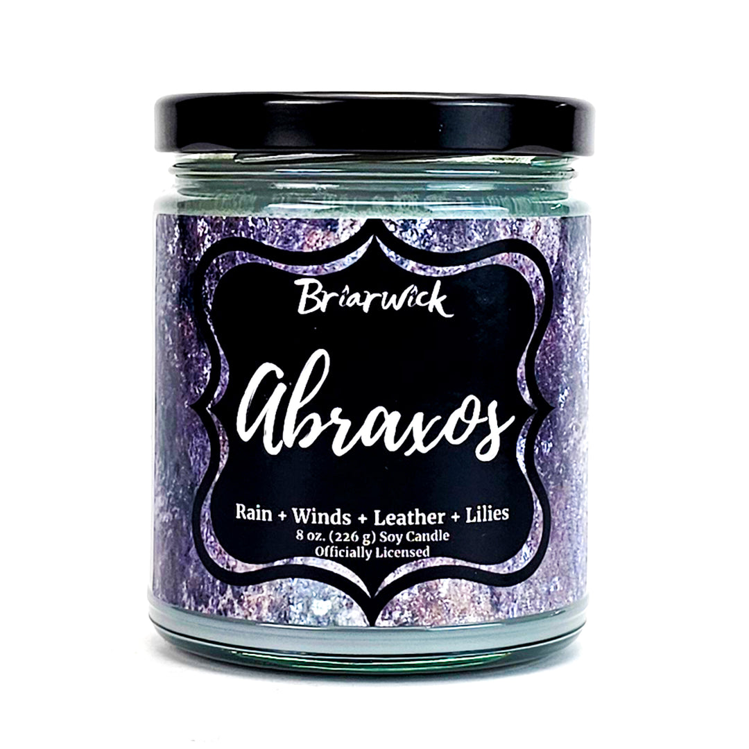 Abroaxos 8oz flint gray candle with gray textured design on a white background