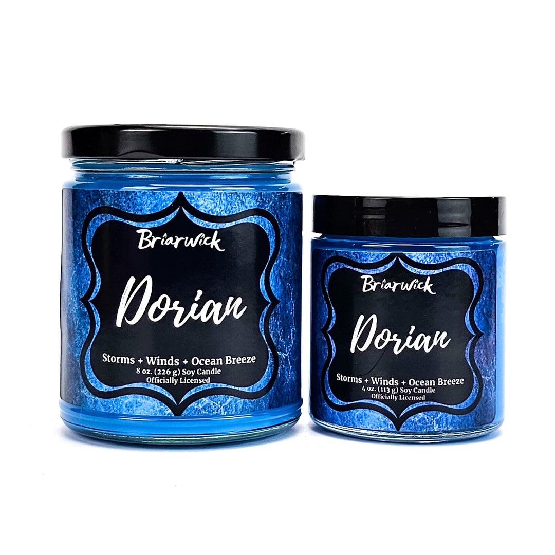 Dorian 8oz & 4oz cobalt candles with blue textured designs on a white background