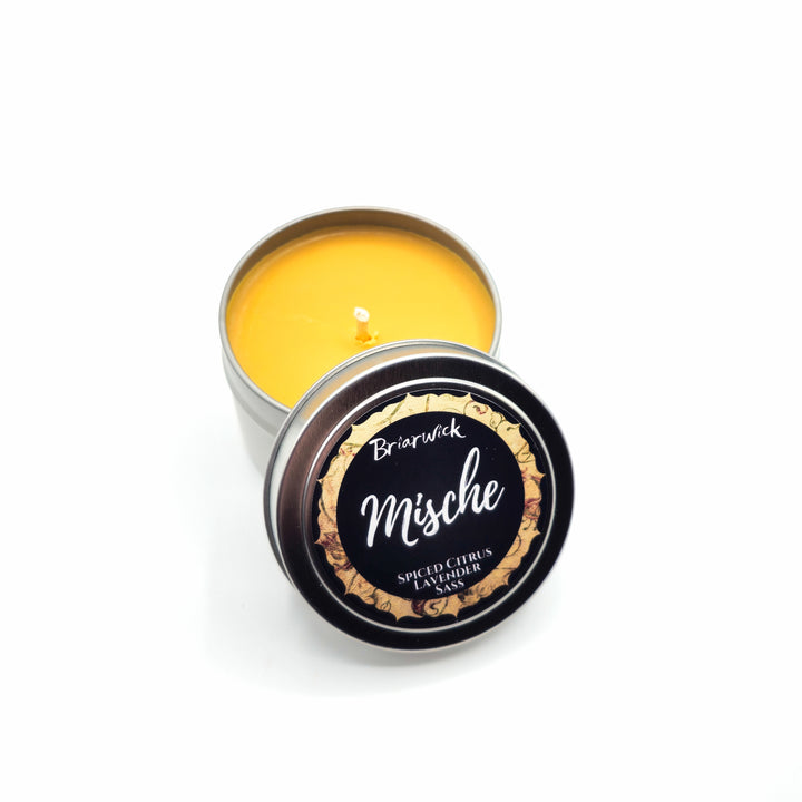 a small tin of lip bale sitting on a white surface