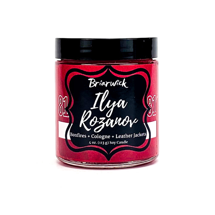 Ilya Rozanov 4oz cherry red candle with red hockey jersey design on a white background