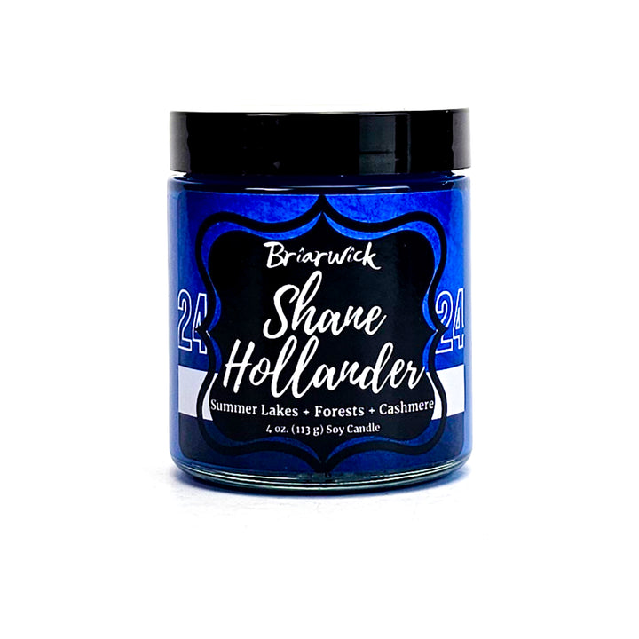 Shane Hollander 4oz lapis candle with blue hockey jersey design on a white background
