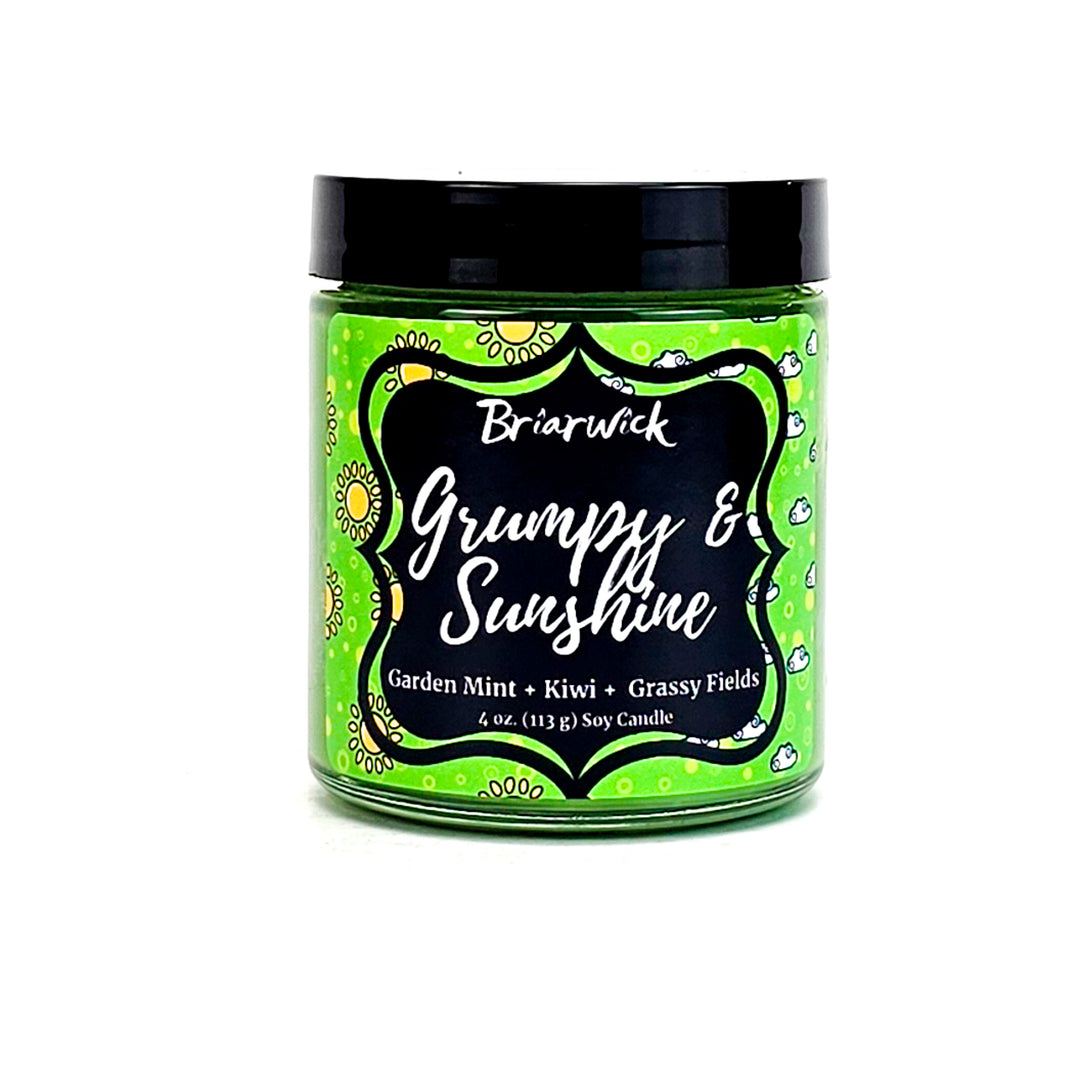Grumpy & Sunshine 4oz lime candle with sunshine/cloud split design on a white background