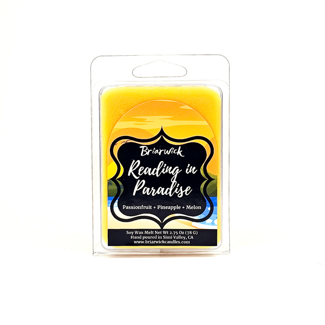 a yellow candle in a package on a white background