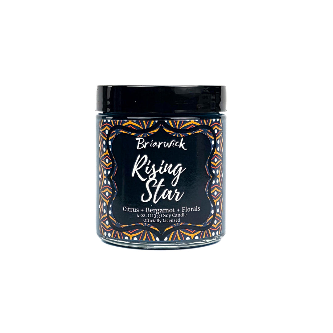 Rising Star 4oz candle jar with decorative label on a white background