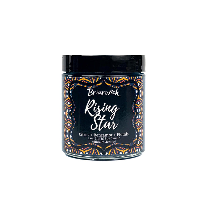 Rising Star 4oz candle jar with decorative label on a white background