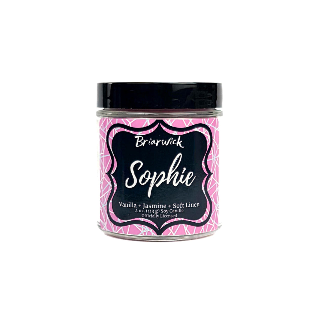 Jar of Briarwick Sophie candle with pink geometric design on a white background