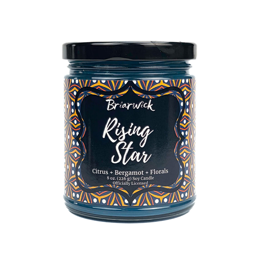 Rising Star 8 oz candle jar with decorative label on a white background