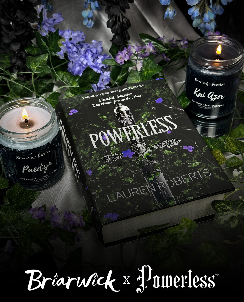 Book titled Powerless by Lauren ROberts with floral ivy background and grey Paedyn and black Kai Azer candle with the text 