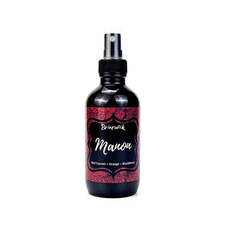 Manon 4oz Linen Spray with red textured design on a white background