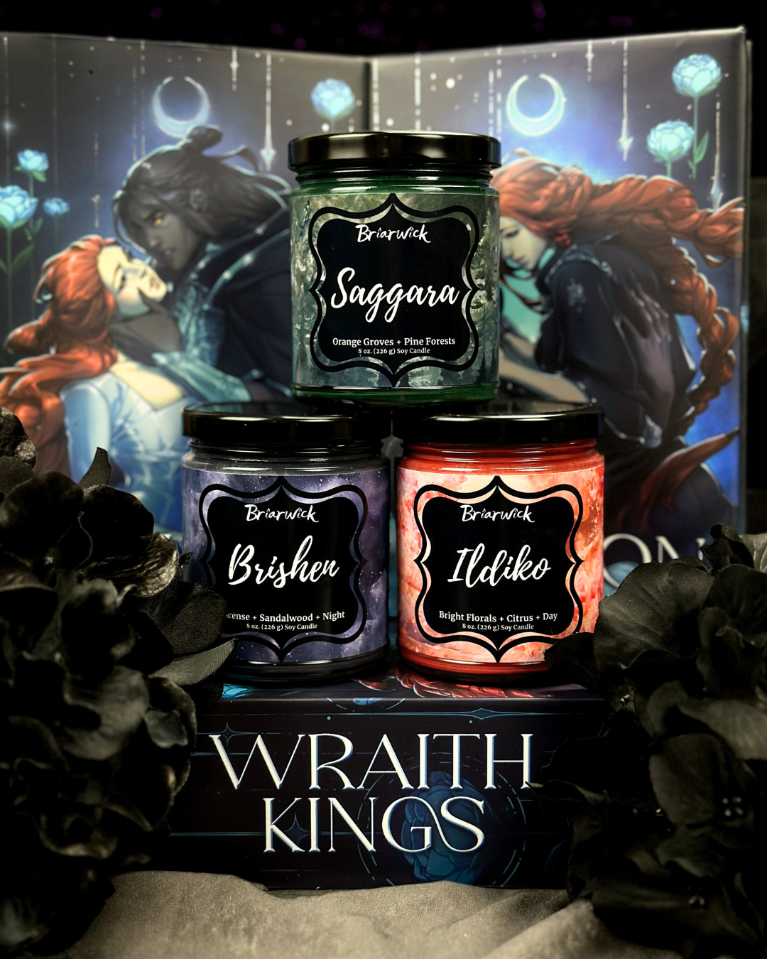 Three candles with labels 'Saggarra', 'BrisheN', and 'Ildiko' in front of a 'Wraith Kings' box with fantasy-themed illustration.