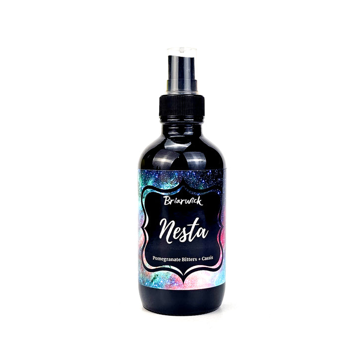 Nesta 4oz Linen Spray with turquoise galaxy design on a white background
