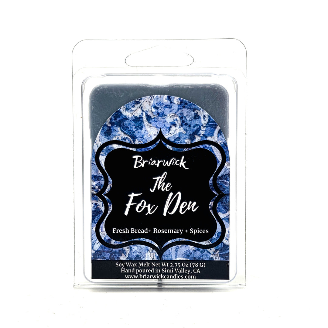 Briarwick The Fox Den soy wax melt in a clear plastic clamshell package, featuring a blue and white patterned wax surface with a black label.