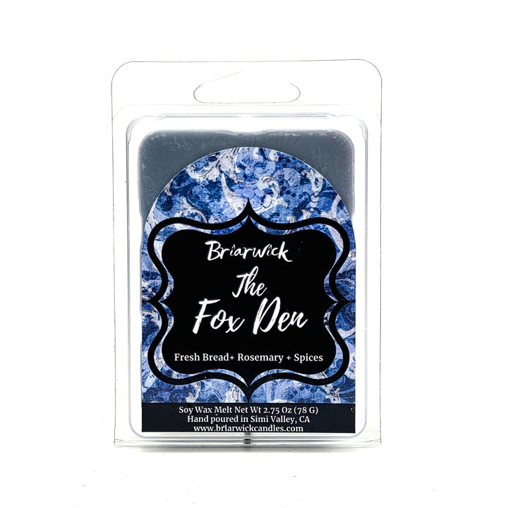 Briarwick The Fox Den soy wax melt in a clear plastic clamshell package, featuring a blue and white patterned wax surface with a black label.