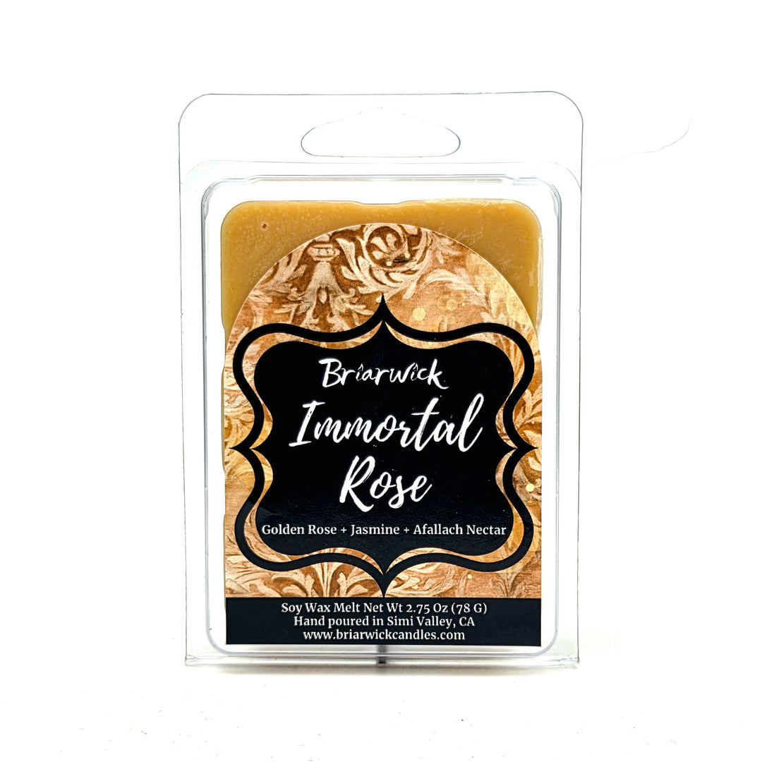 Briarwick Immortal Rose soy wax melt in a clear plastic clamshell package, showing a golden-brown wax melt with a black and gold label.