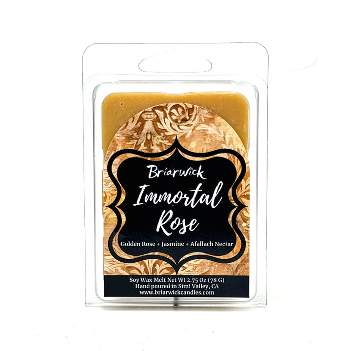 Briarwick Immortal Rose soy wax melt in a clear plastic clamshell package, showing a golden-brown wax melt with a black and gold label.
