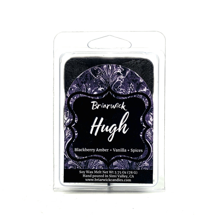 Briarwick Hugh soy wax melt in a clear plastic clamshell package with a black and purple label, on a white background.