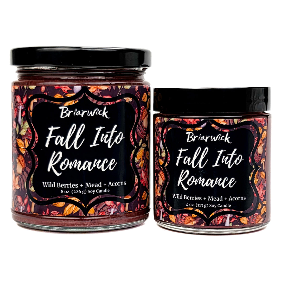 Fall Into Romance 8oz & 4oz auburn candles with foliage patterns on a white background