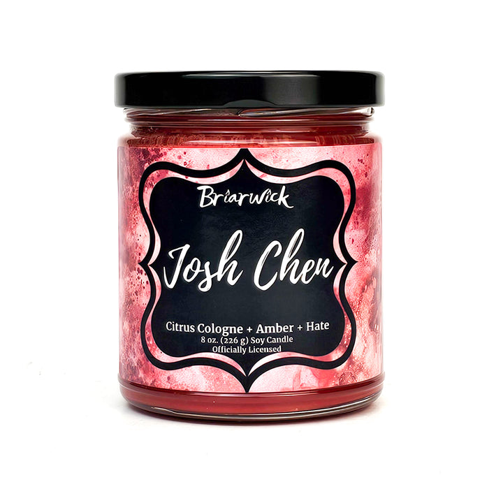 Josh Chen 8oz cherry red candle with red textural design on a white background