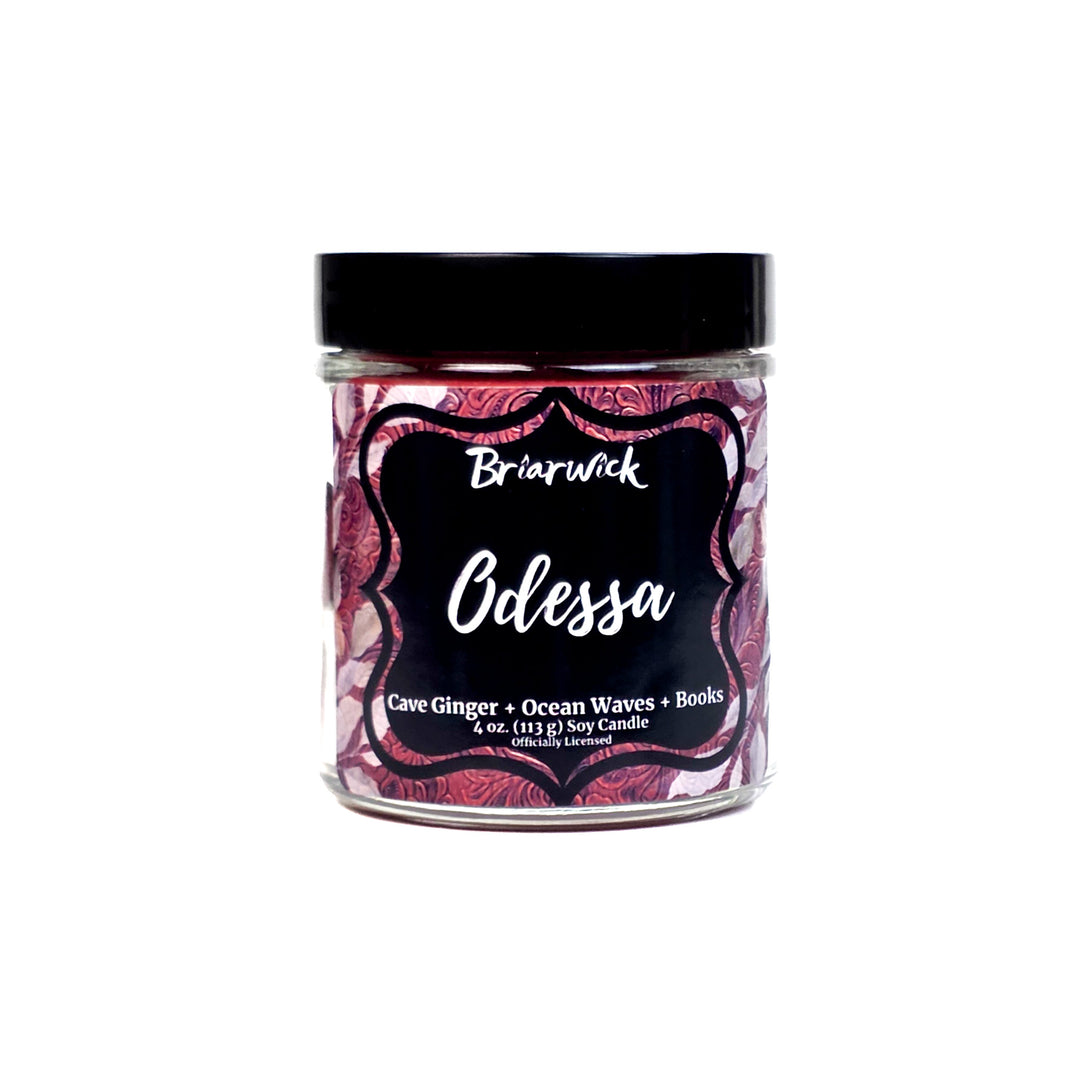 Jar of Briarwick Odessa candle with red floral design on a white background